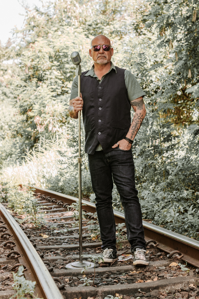 Lead singer close-up portrait outdoors